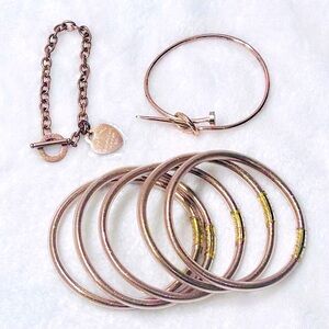 NWOT Set of 7 rose gold bracelets